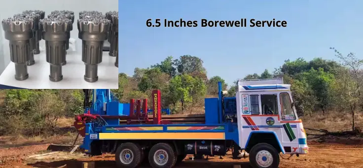 A truck holding a borewell machine with drilling tools meant for 6.5-inch borewell service.