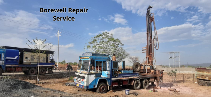 A truck loaded with equipments and a borewell drilling machine were cleaning the land borewell.